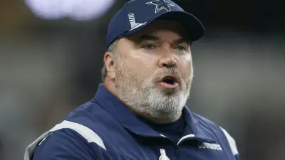Mike McCarthy coaching the Cowboys