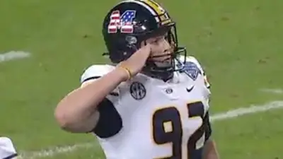 Missouri kicker salutes after a field goal