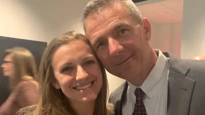 Urban Meyer poses with his daughter Gigi