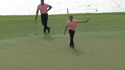 Charlie Woods putter raise