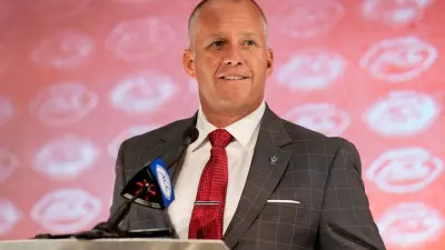 Dave Doeren at a press conference