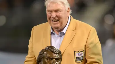 John Madden in a gold jacket