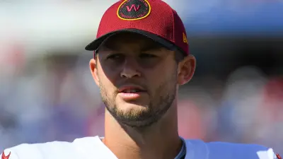 Kyle Allen wearing a cap
