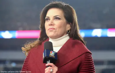 Michele Tafoya holding an NBC mic