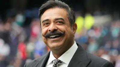 Shad Khan smiling