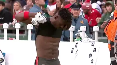 Antonio Brown strips off his uniform