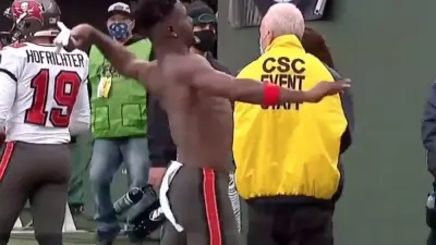 Antonio Brown throws his uniform into the stands