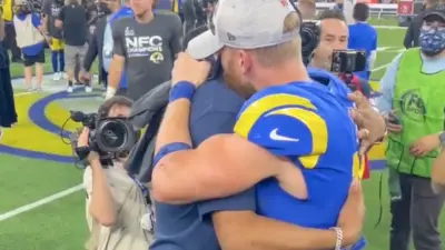 Cooper Kupp and Robert Woods share a hug