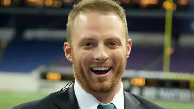 Greg McElroy on the field
