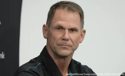 Trent Baalke at a press conference
