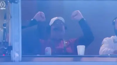 Bill OBrien with his arms raised