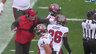 Bruce Arians smacking a helmet