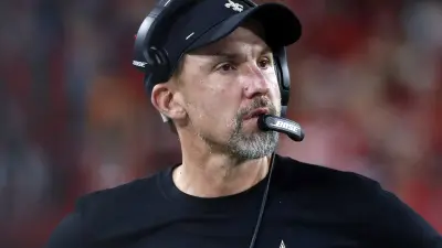 Dennis Allen in a headset