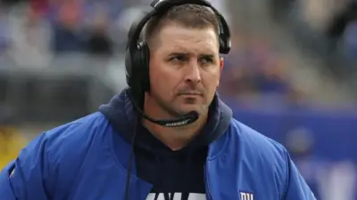 Joe Jude with a headset on