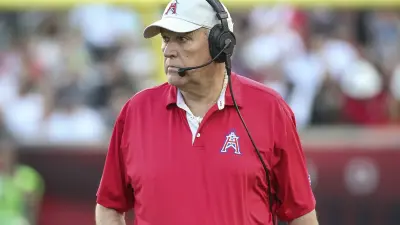 June Jones on the sidelines