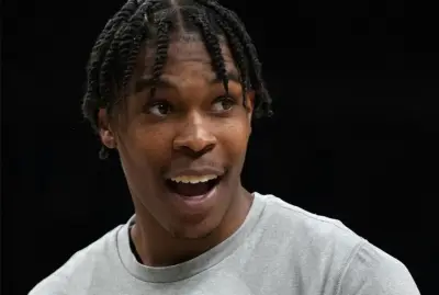 Kam McGusty looking on