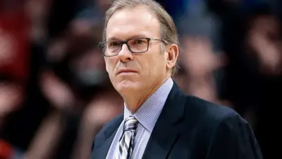 Kurt Rambis in a suit
