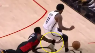 Kyrie Irving going for a loose ball