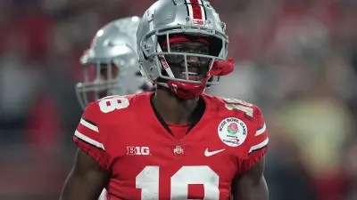 Marvin Harrison Jr smiles on the field