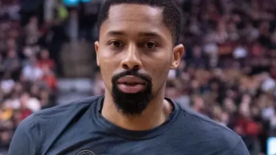 Spencer Dinwiddie looking on