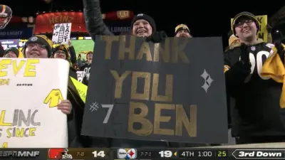 Steelers fan with a poster
