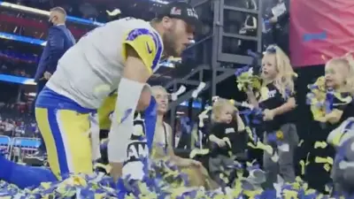 Matthew Stafford celebrates with his kids at the Super Bowl