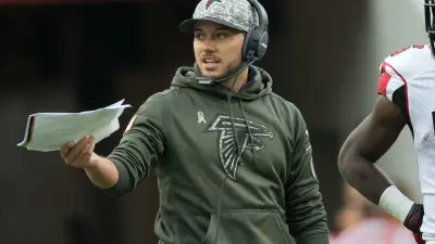 Mike McDaniel coaches for the Falcons
