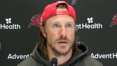 Blaine Gabbert talks with the media