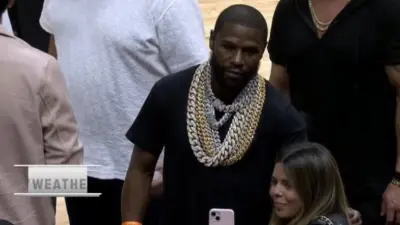 Floyd Mayweather wearing a lot chains