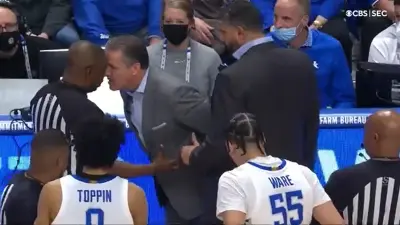 John Calipari and referee