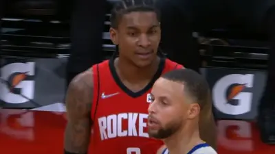 Kevin Porter Jr staring at Steph Curry