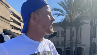 Les Snead wears his shirt