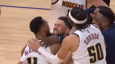 Monte Morris gets a hug