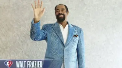 Walt Frazier in a colorful jacket