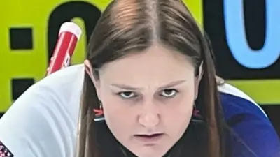Zuzana Paulova competing at curling
