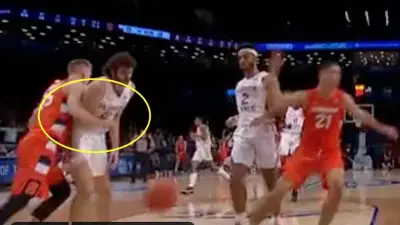 Buddy Boeheim punches an opponent