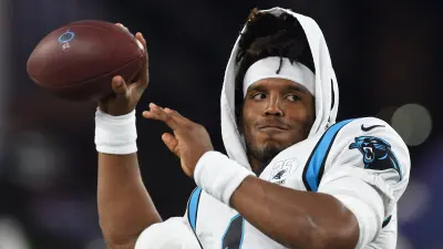 Cam Newton throws in warmups
