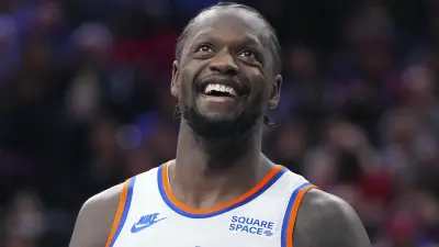 Julius Randle smiles during a Knicks game