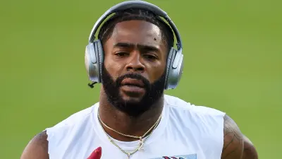 Malcolm Butler warms up before a game