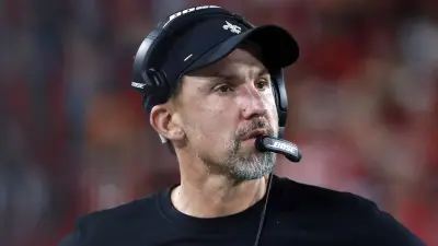 Dennis Allen in a headset