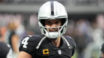 Derek Carr in a helmet