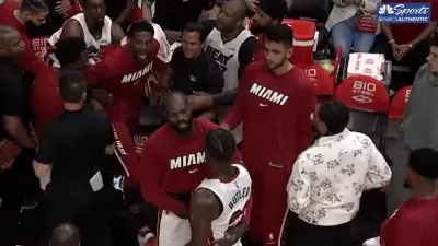 Erik Spoelstra talks with Jimmy Butler