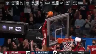 Indiana cheerleader reaches up