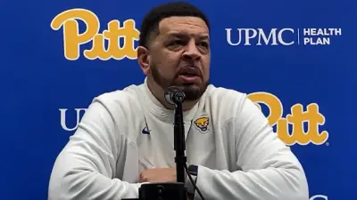 Jeff Capel with the media