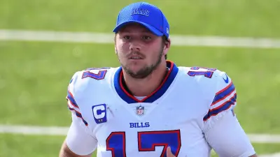 Josh Allen wears a Bills hat