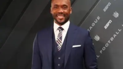 Louis Riddick in a suit