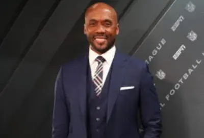 Louis Riddick in a suit