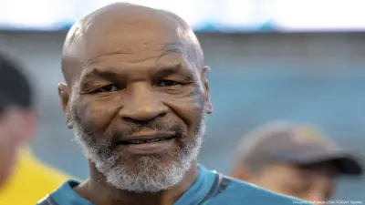 Mike Tyson looking on