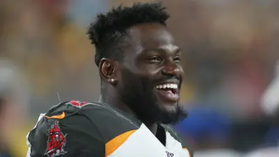 Shaq Barrett smiling during a game