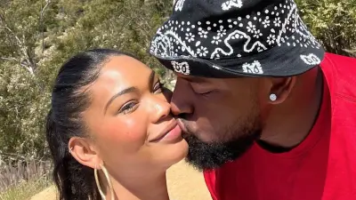 Davon Godchaux kisses Chanel Iman